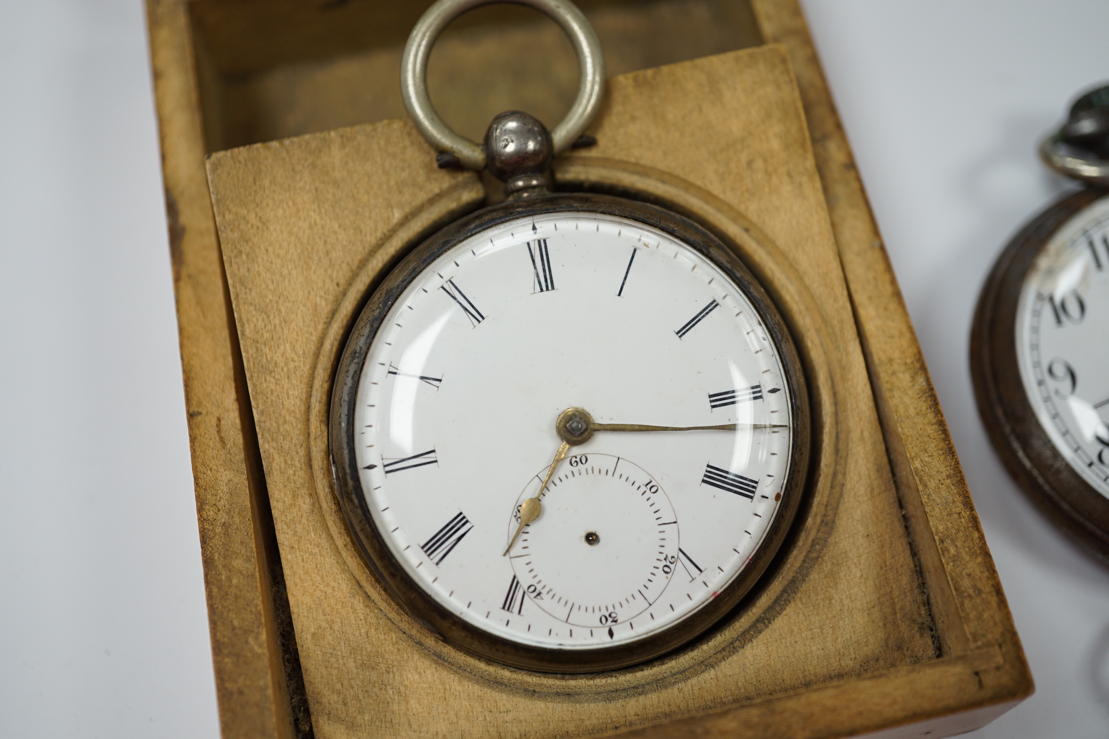 A Victorian silver open faced pocket watch, a silver fob watch, one other base metal pocket watch and a metal cased Lemania GPO stop watch, together with a base metal albert with spinning fob.